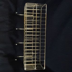 Hanging metal basket with hooks